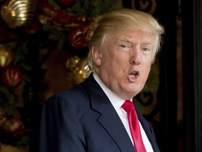 President-elect Donald Trump speaks to members of the media at Mar-a-Lago, in Palm Beach, Fla., Wednesday, Dec. 21, 2016