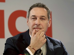 Heinz-Christian Strache, chairman of the anti-migrant and anti-EU Freedom Party FPOE, gestures during a news conference after the presidential election in Vienna, Austria, Tuesday, Dec. 6, 2016.