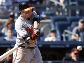 Steve Pearce, who signed with the Toronto Blue Jays on Dec. 5, singles as a member of the Baltimore Orioles in an Aug. 28 game against the New York Yankees.