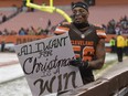 Cleveland Browns inside linebacker Christian Kirksey holds a sign after the Browns lost to the Cincinnati Bengals on Dec. 11.