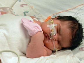 Mia Yasmin Garcia, shortly after birth Dec. 2, 2014, was born by cesarean section, weighing 13 pounds, 13 ounces. Mia's father, Francisco Garcia, says the newborn's size shocked everyone, including hospital staff.