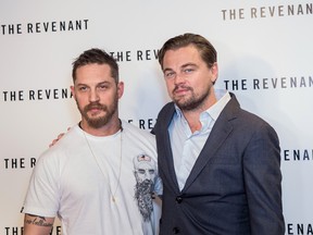 Tom Hardy, left,  and Leonardo DiCaprio pose for photographers during a photo call for the film 'The Revenant' in London, Sunday, Dec. 6, 2015.