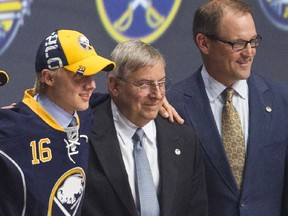 Alexander Nylander, left, at the 2016 NHL draft with Buffalo Sabres owner Terry Pegula and head coach Dan Bylsma.