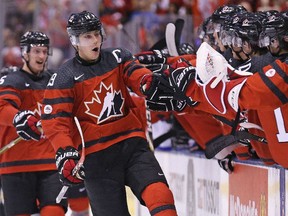 Dylan Strome celebrates a goal against Russia during Monday's opening game at the 2017 world junior hockey championship in Toronto. Canada plays Latvia in its third game on Thursday.