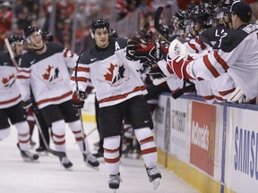 Canada's Matt Barzal celebrates his goal to open the scoring in Canada's lopsided victory over Latvia at the world junior hockey championship on Thursday, Dec. 29, 2016.