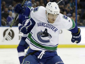 Jack Skille of the Vancouver Canucks celebrates after scoring against the Lightning during the first period of their game Thursday night in Tampa, Fla.