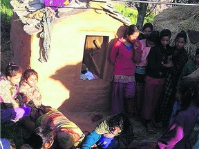 Roshani Tiruwa is mourned outside the hut to which she was banished.