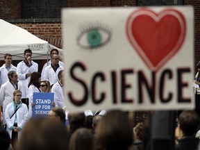 Scientists rally on Tuesday, Dec. 13, 2016, in San Francisco, to call attention to what they believe are unwarranted attacks by the incoming Trump administration against scientists advocating for the issue of climate change and its impact.
