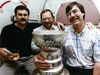 Cam Cole (left) sits with the Stanley Cup and Edmonton Journal colleagues Ray Turchansky (centre) and Jim Matheson in 1990.
