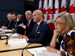 Members of the House of Commons special committee on electoral reform hold a news conference in Ottawa on Dec. 1, 2016. MP Nathan Cullen is second from right.