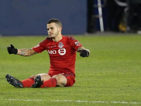 Toronto FC forward Sebastian Giovinco sits on the field during the MLS Cup final against Seattle on Dec. 10.