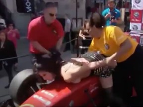 Femen activist Neda Topaloski crashes a Grand Prix street party in Montreal in 2015.