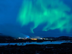 The Aurora Borealis over Iceland's Blue Lagoon.