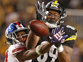 New York Giants cornerback Eli Apple breaks up a pass intended for Pittsburgh Steelers tight end Ladarius Green during the second half of an NFL football game in Pittsburgh, Sunday, Dec. 4, 2016.
