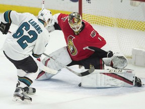 San Jose Sharks right wing Kevin Labanc puts the game winner through the legs of Ottawa Senators goalie Mike Condon during the shootout on Wednesday in Ottawa.