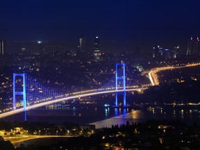 The Bosporus Bridge, which connects the Asian, right, and European sides of the city in Istanbul, Turkey.