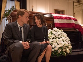 Peter Sarsgaard as Bobby Kennedy, and Portman as Jackie.