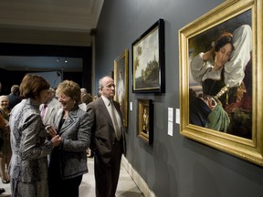 A man looks at a just-unveiled Girl from the Sabine Mountains by Franz-Xaver Winterhalter (1805-1873) at the Montreal Museum of Fine Arts in Montreal Wednesday, May 20, 2009. To mark the fifth anniversary of the Max Stern Art Restitution Project, the three university beneficiaries of the Estate of Max Stern (Concordia University, McGill University/Montreal, Hebrew University/Jerusalem) hosted a return ceremony for the seven Old Master and Nineteenth Century paintings thus far recovered.