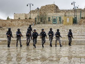 Jordanian security forces patrol Karak Castle about 140 kilometers south of the capital Amman, in Jordan Monday, Dec. 19, 2016.