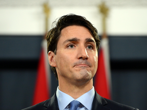 Prime Minister Justin Trudeau holds a press conference at the National Press Theatre in Ottawa on Monday, Dec. 12, 2016.