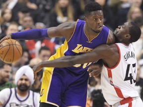 Toronto Raptors forward Pascal Siakam (right) defends against Los Angeles Lakers forward Julius Randle on Dec 2.