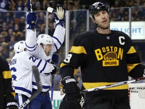 oronto Maple Leafs' James van Riemsdyk celebrates his goal with Nikita Soshnikov behind the Bruins' Zdeno Chara during the third period of their game in Boston on Saturday night. The Leafs won 4-1.