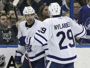Nazem Kadri celebrates with Toronto Maple Leafs teammate William Nylander after scoring against the Tampa Bay Lightning on Dec. 29.