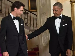 US President Barack Obama (R) and Canadian Prime Minister Justin Trudeau (C) at the White House March 10, 2016 in Washington, DC.