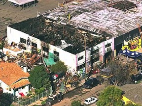 This Dec. 3, 2016 image from video provided by KGO-TV shows the Ghost Ship Warehouse after a fire that started late Friday swept through the Oakland, Calif., building