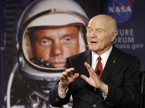 U.S. Sen. John Glenn talks with astronauts on the International Space Station via satellite Feb. 20, 2012. Glenn, who was the first U.S. astronaut to orbit Earth and later spent 24 years representing Ohio in the Senate, has died at 95.