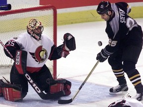 The Ottawa Senators vs the Pittsburgh Penquins at the Corel Centre.  Janne Hurme is in position against Kevin Stevens in the first period with no goal scored.
