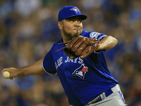 In this Aug. 5 file photo, then-Toronto Blue Jays reliever Joaquin Benoit pitches against the Kansas City Royals.