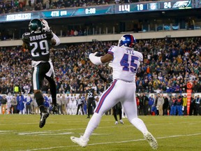 Philadelphia Eagles' cornerbrook Terrence Brooks picks off an Eli Manning pass intended for Willy Tye late in the fourth quarter of Thursday's NFL game in Philadelphia. Manning was picked off three times and the Eagles went on to post a 24-19 victory, denying the Gaints a chance to clinch a playoff spot.