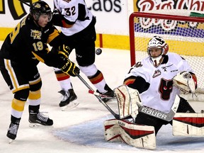 In this April 28, 2015 file photo, Brandon Wheat Kings forward Nolan Patrick (left) — the prospective No. 1 pick in the 2017 draft — shoots in a playoff game against the Calgary Hitmen.