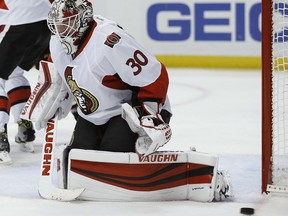 Ottawa Senators goalie Andrew Hammond deflects a shot against the Anaheim Ducks on Dec. 11.