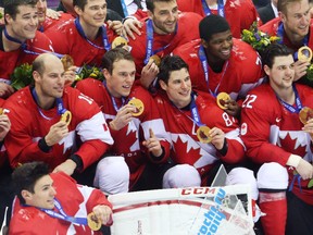 Canada's NHL stars celebrate their victory against Sweden in the gold-medal game at the 2014 Winter Olympics in Sochi on Feb. 23, 2014.