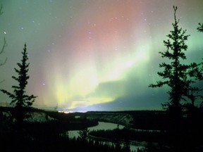 The aurora borealis ripples with colour over the Yukon River.