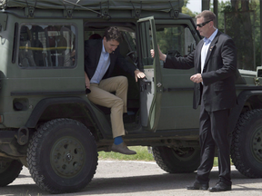 Canadian Prime Minister Justin Trudeau gets out of a Canadian military G-wagon as he tours the International Peacekeeping and Security Centre near Yavoriv, Ukraine Tuesday July 12, 2016.