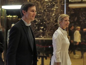 Jared Kushner and his wife Ivanka Trump walk through the lobby of Trump Tower in New York, Friday, Nov. 18, 2016