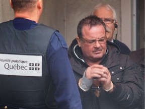 Raynald Desjardins leaves the Joliette courthouse,  north of Montreal, on Dec. 21, 2011. Desjardins has been sentenced for his role in the murder of rival Salvatore (Sal the Ironworker) Montagna.