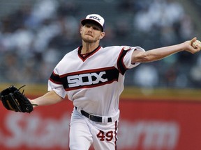 In this Oct. 2 file photo, then-Chicago White Sox starter Chris Sale pitches against the Minnesota Twins. Sale signed with the Boston Red Sox on Dec. 6.