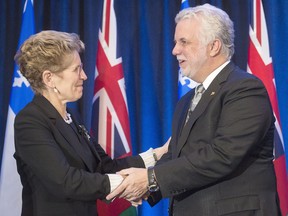Ontario Premier Kathleen Wynne and Quebec Premier Philippe Couillard.