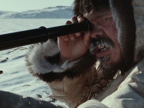 Scene fromt the movie Maliglutit (Searchers), directed by Zacharias Kunik. An Inuit take on the 1956 John Ford western The Searchers, and tells of a manís hunt for his kidnapped wife and daughter.