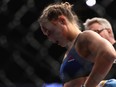 Ronda Rousey reacts to her loss to Amanda Nunes in their UFC women's bantamweight championship bout during the UFC 207 event on December 30, 2016 in Las Vegas, Nevada.