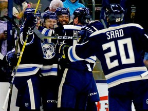 William Karlsson is congratulated by his Blue Jackets teammates after scoring a power play goal during the second period of their game against the Edmonton Oilers on Tuesday night at Nationwide Arena in Columbus, Ohio.