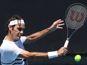 Roger Federer of Switzerland plays a backhand during a practice session ahead of the 2017 Australian Open at Melbourne Park on January 12, 2017 in Melbourne, Australia.