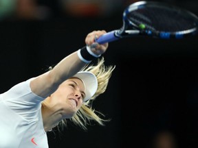 Eugenie Bouchard serves in her third round match against Coco Vandeweghe of the United States on day five of the 2017 Australian Open at Melbourne Park.