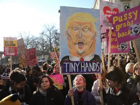 LONDON, ENGLAND - JANUARY 21:  Protesters make their way through the streets of London during the Women's March on January 21, 2017 in London, England. The Women?s March originated in Washington DC but soon spread to be a global march calling on all concerned citizens to stand up for equality, diversity and inclusion and for women?s rights to be recognised around the world as human rights. Global marches are now being held, on the same day, across seven continents  (Photo by Dan Kitwood/Getty Images)