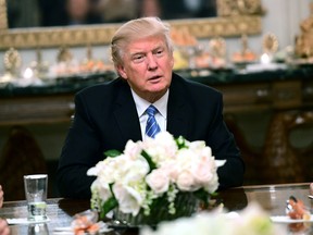 Trump hosts a reception for House and Senate Republican and Democratic leaders in the State Dining Room of the White House January 23, 2017