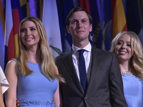 This file photo taken on November 9, 2016 shows (From L) Ivanka Trump, her husband Jared Kushner and Tiffany Trump during election night at the New York Hilton Midtown in New York.